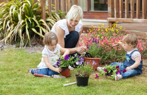 Gardening team preparing a transparent quote for a small Becontree Heath front garden